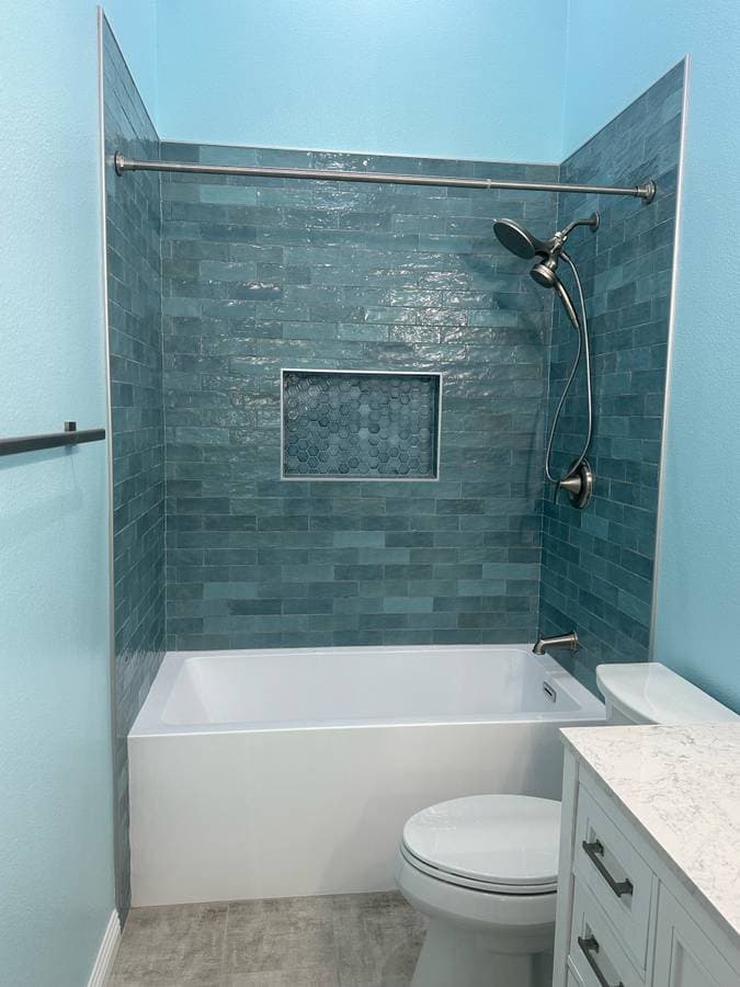 newly installed shower and bathtub with custom backsplash and tiles