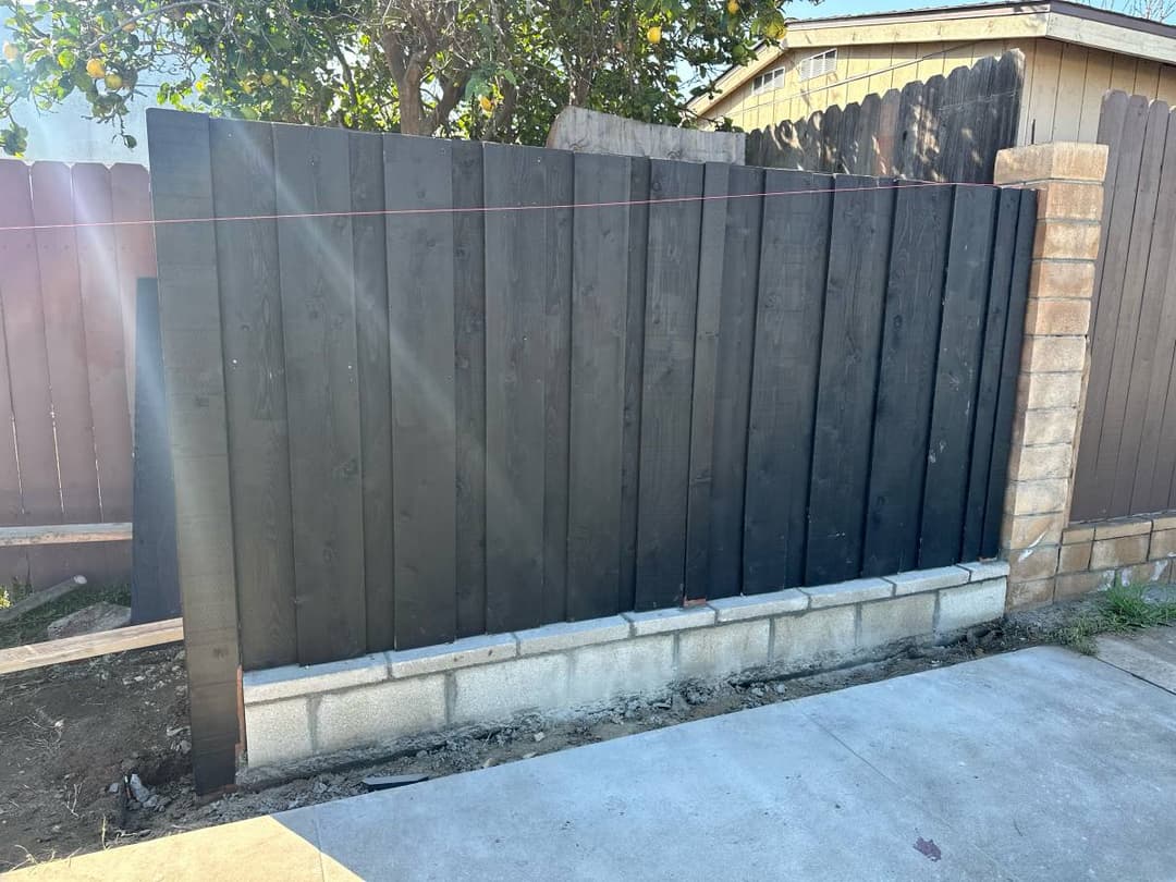 newly installed fence in a backyard